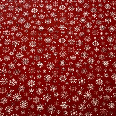 Snöflinga - röd bakgrund bomullsjersey